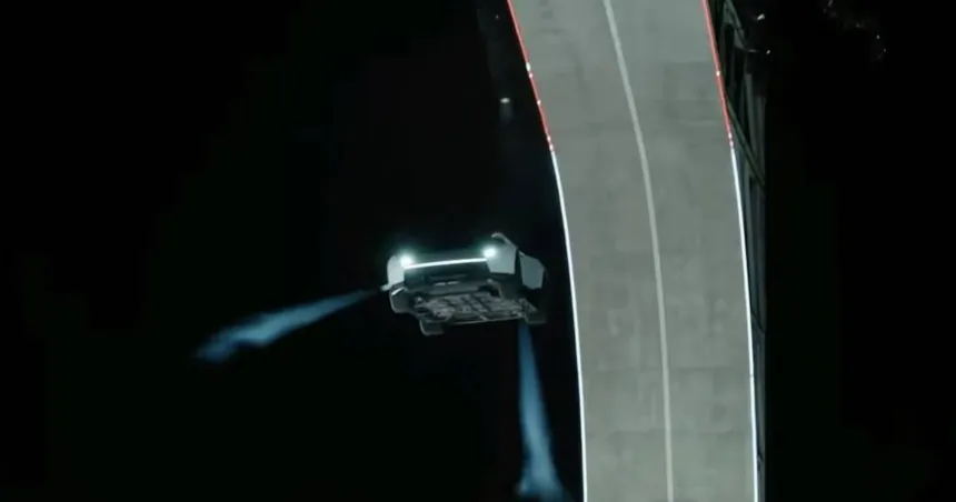 El nuevo Tesla Roadster en el aire, con los propulsores encendidos, junto a la rampa por la que salió.